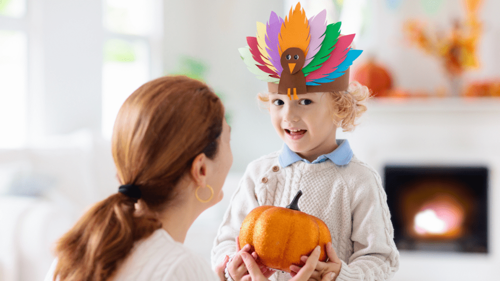 little boy with a turkey hat | 