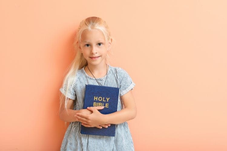 little girl with a Bible