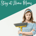smiling stay-at-home mom with a broom