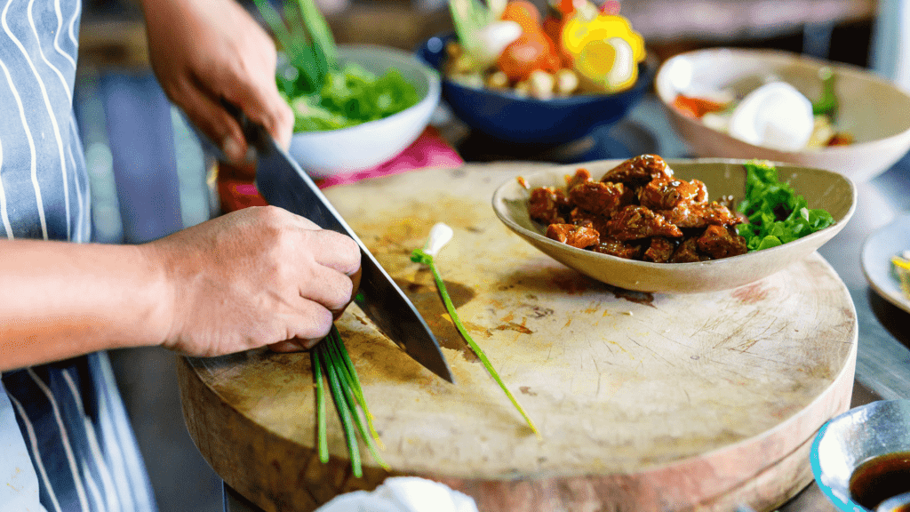 chopping food to prep a meal