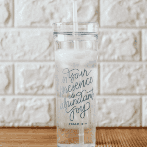 clear tumbler that says "in your presence is abundant joy"