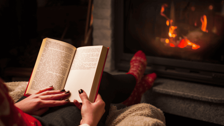 woman reading at Christmas