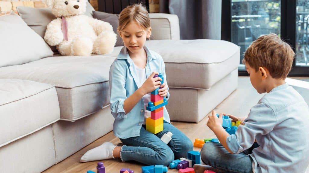 kids playing with building toys