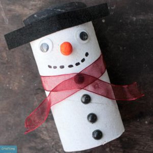 snowman craft made from a toilet paper roll