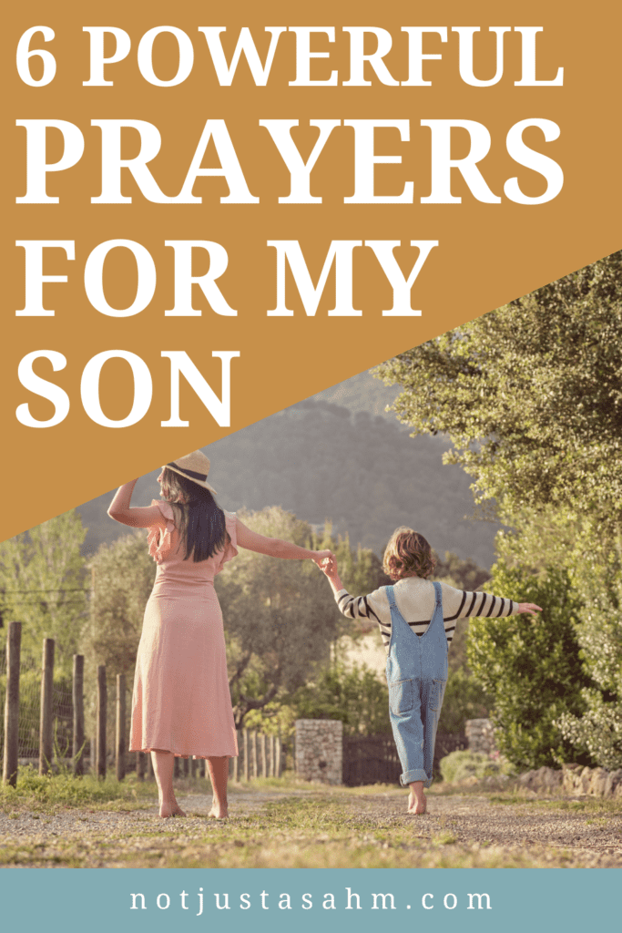 mother and son walking through a forest