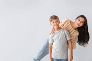 woman smiling with her son