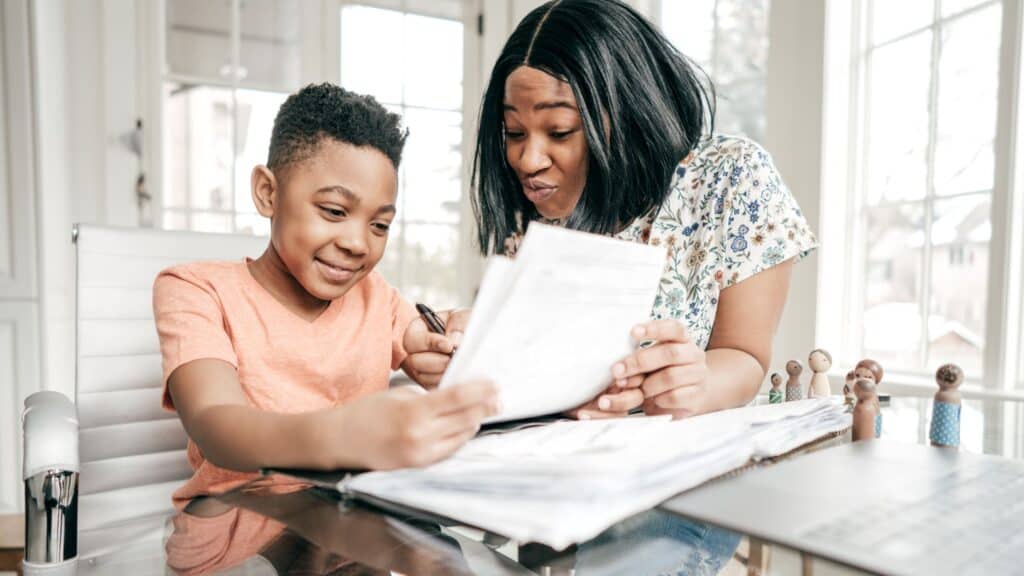 mother and son doing homework