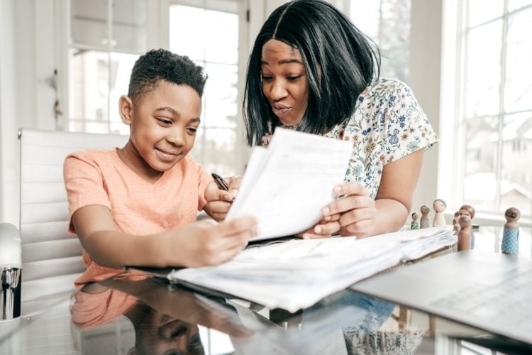 mom helping her son with homework