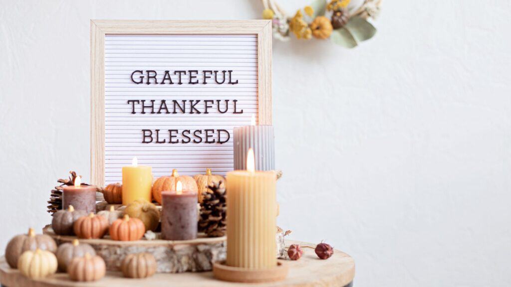 Thanksgiving letter board reading "Grateful. Thankful. Blessed."