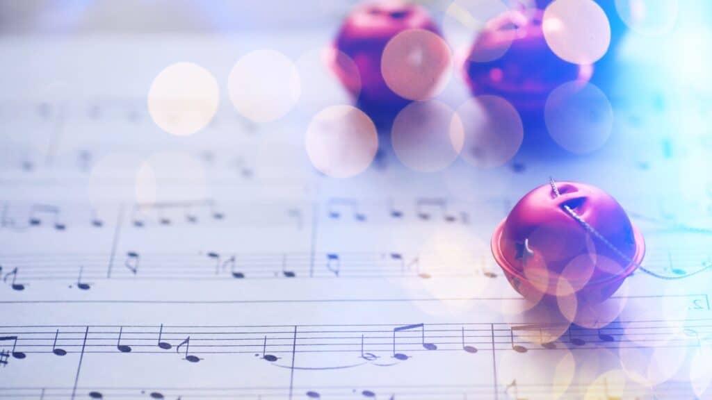 Christmas carol sheet music with ornaments