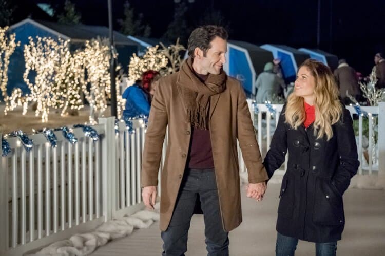 image of Candace Cameron Bure and Eion Bailey in Switched for Chrismtas