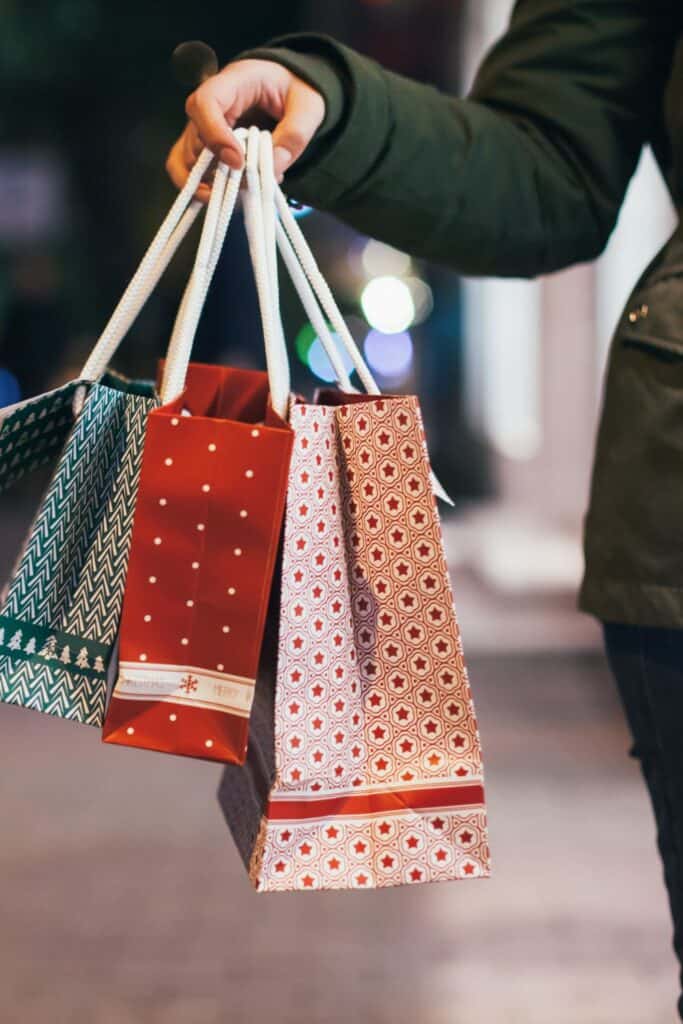 woman holding gift bags