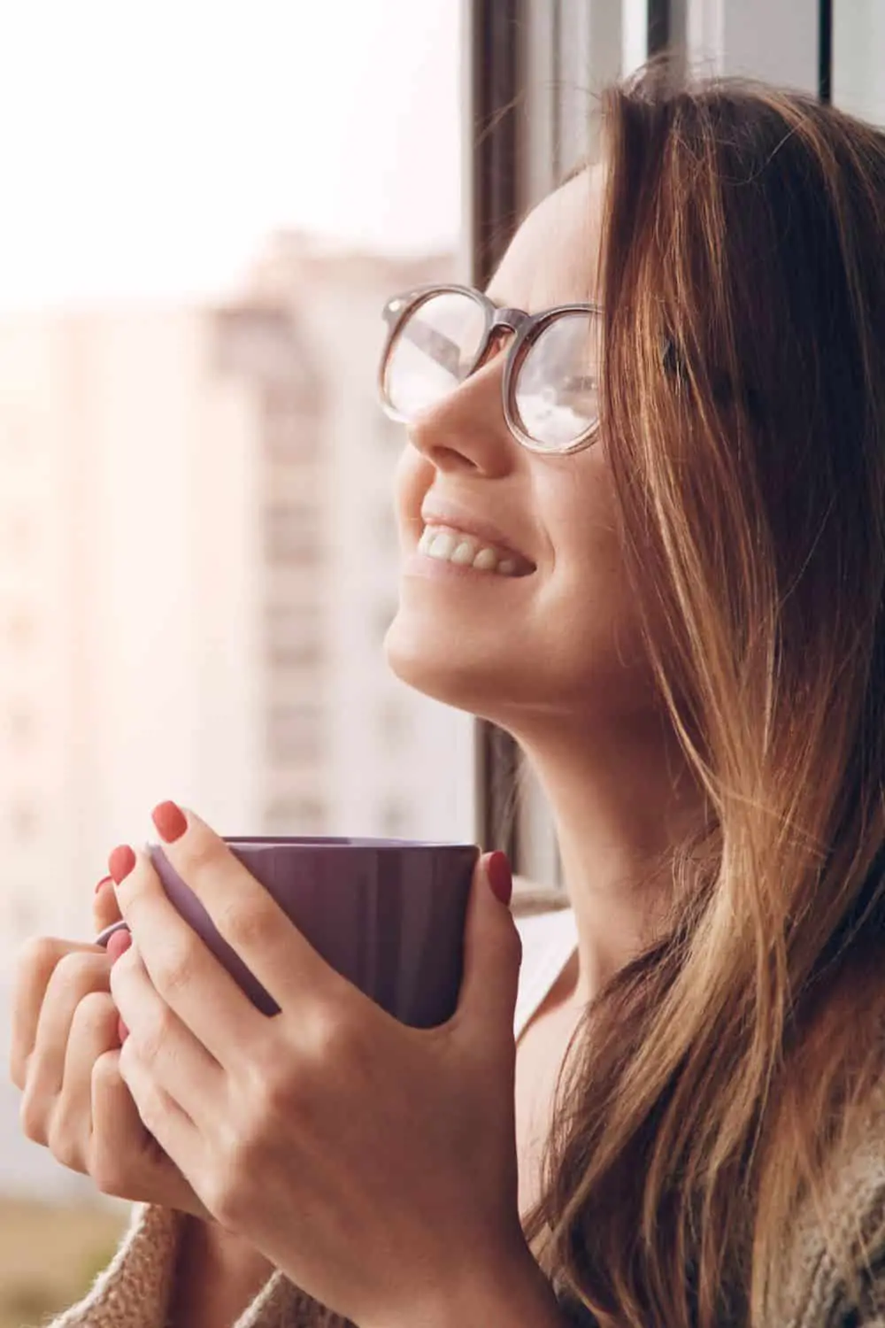 woman enjoying coffee in the morning