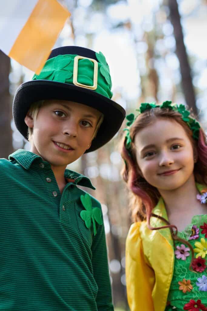 two children dressed in traditional Irish clothing for st. patrick's day