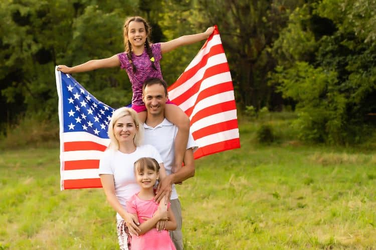 family with a flag on memorial day