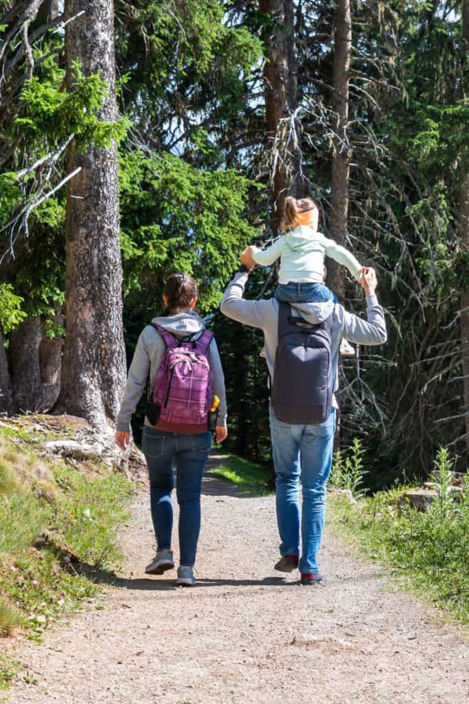 family enjoying an outdoor hike together