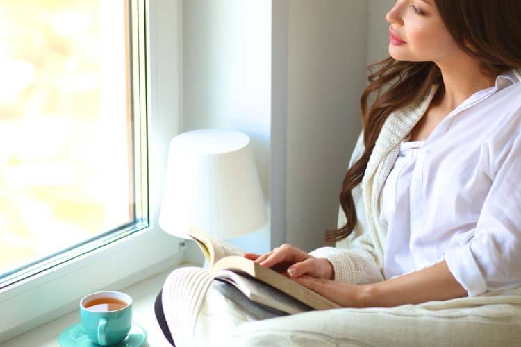 woman reading her bible in the morning
