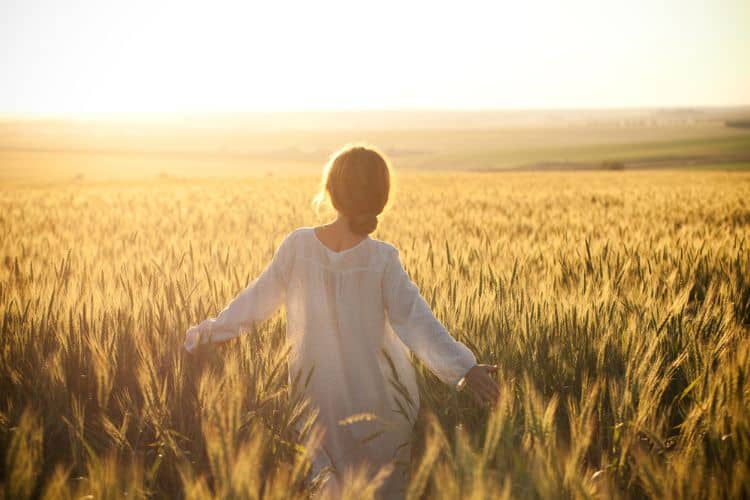 woman walking in a field