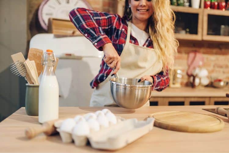 woman cooking in her kitchen