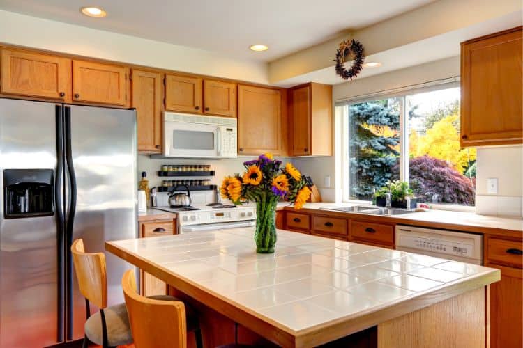 kitchen island with a vase of flowers
