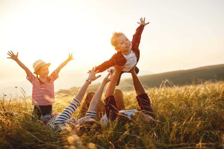family playing outside together