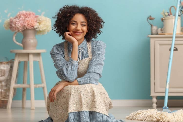 happy homemaker with a mop