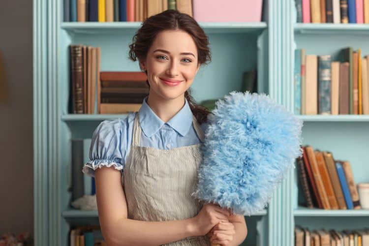homemaker with a feather duster